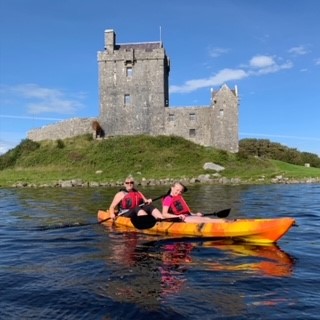 Deirdre and her family doing water activities