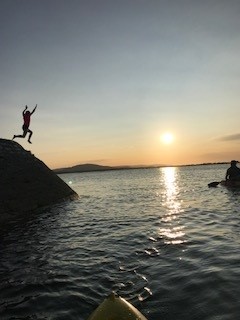 Deirdre and her family jumping into the sea in Galway