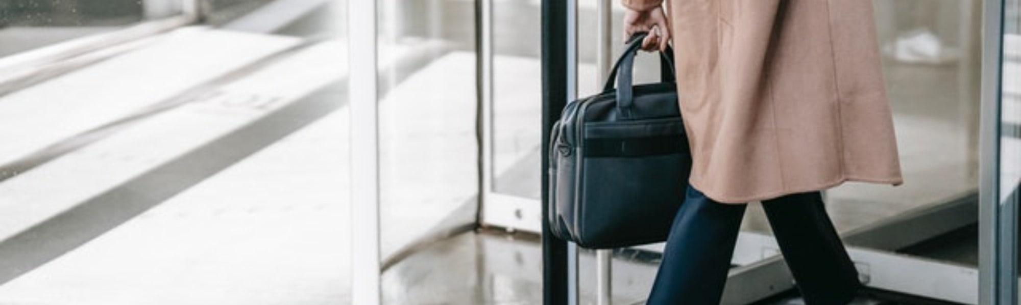 Woman carrying a bag to her new job 